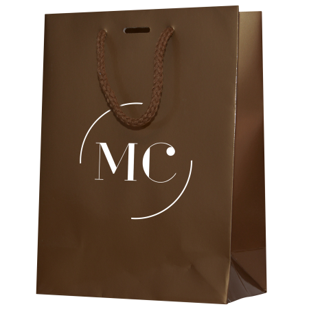 A brown coloured luxury paper bag available with a custom logo or image printed on the front at Helloprint