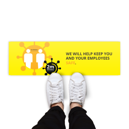Rectangular floor sticker with a yellow background and the text 