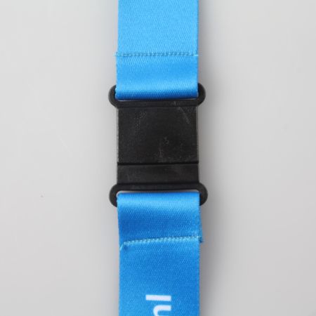 A black clip on connected to a blue thread, print it at Helloprint.