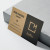 Business cards with Kraft Brown paper type and a design example, available at Helloprint